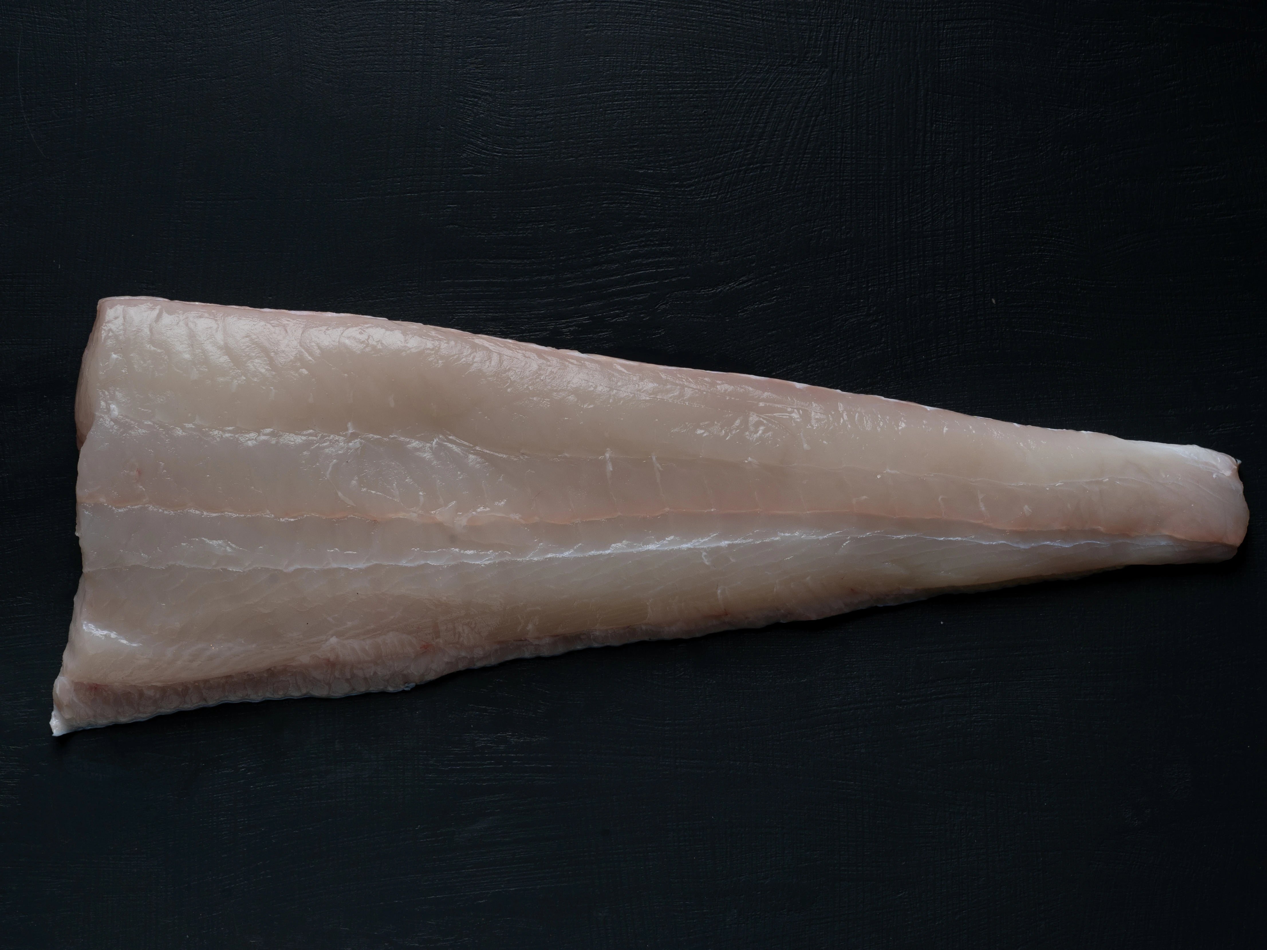 Fersk kveite filet i porsjonstykker fra Havøyet. Levert helt hjem på døren i Bergen og omegn.